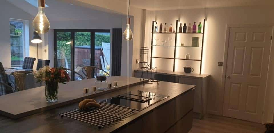 Modern open-plan kitchen extensions in Glasgow with central island and dining area